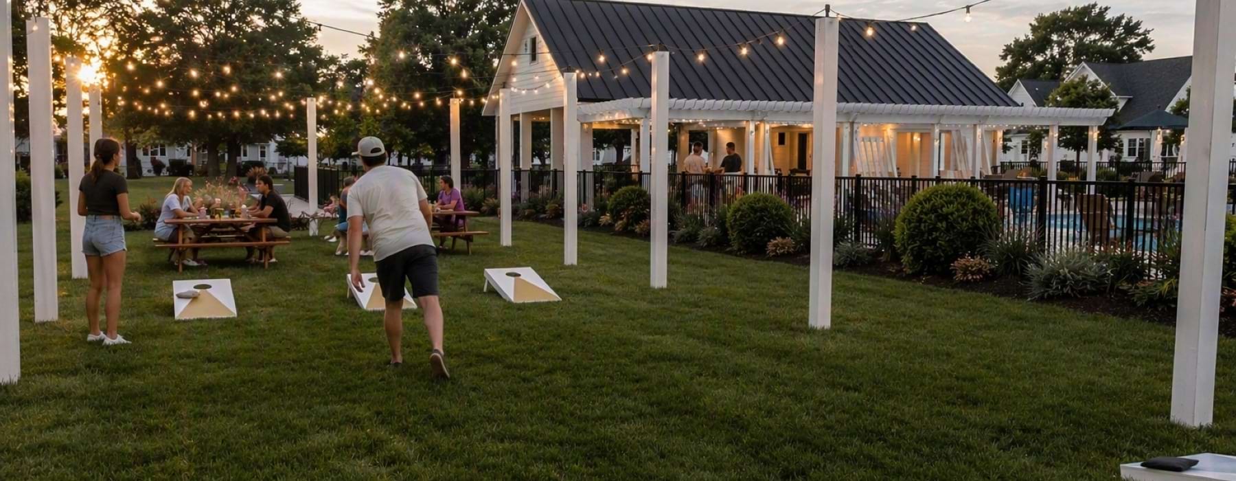 People playing cornhole at Sunset